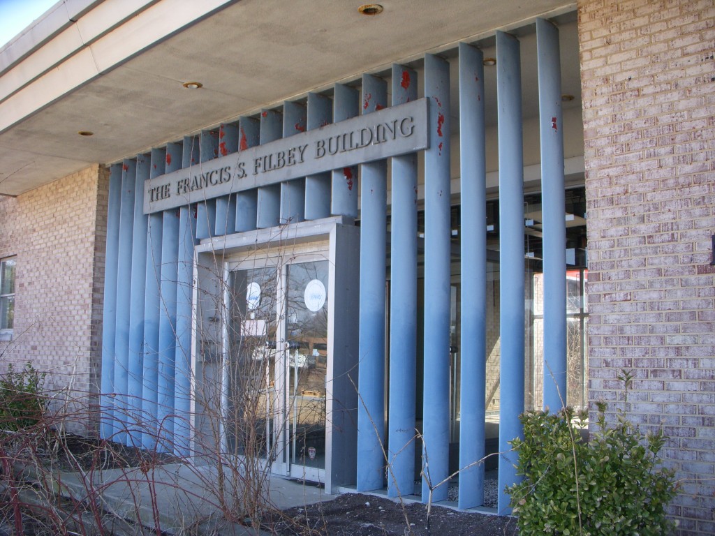 The USI Robodyne Automation Center, 12345 Columbia Pike, has louvered panels that bring light and air into graveled recessed spaces flanking the front vestibule. The building has a high level of architectural 