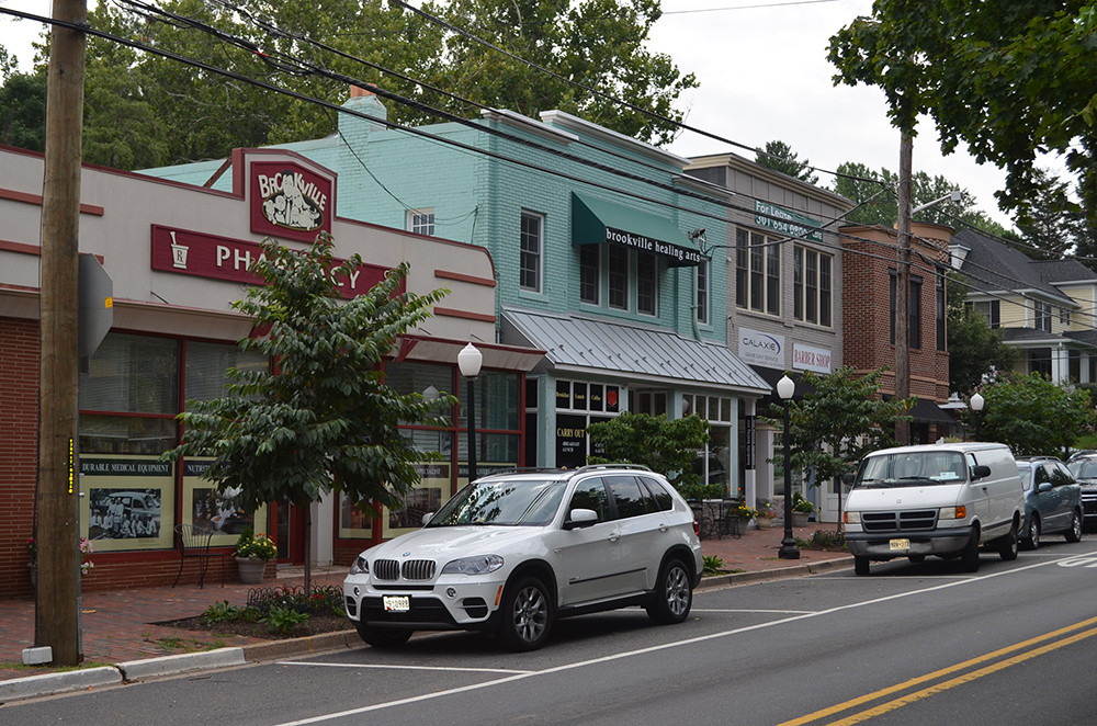 The single block of retail on Brookville Road in the suburban residential neighborhood of Chevy Chase, MD is walkable, mixed-use and active – Urbanism at its best!
