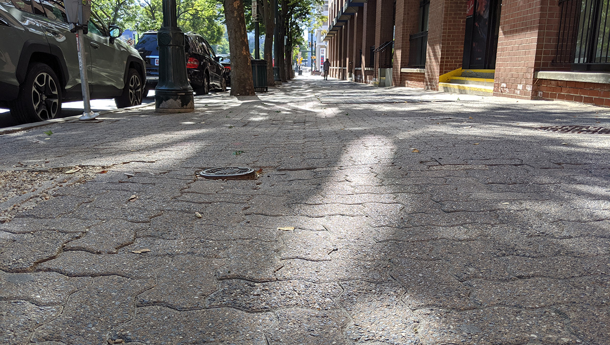 Uneven sidewalk surface