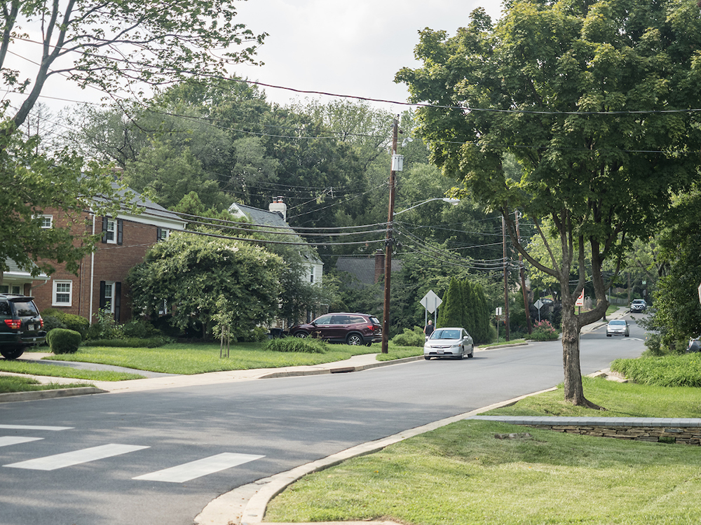 Residential street with crosswalk and no centerline