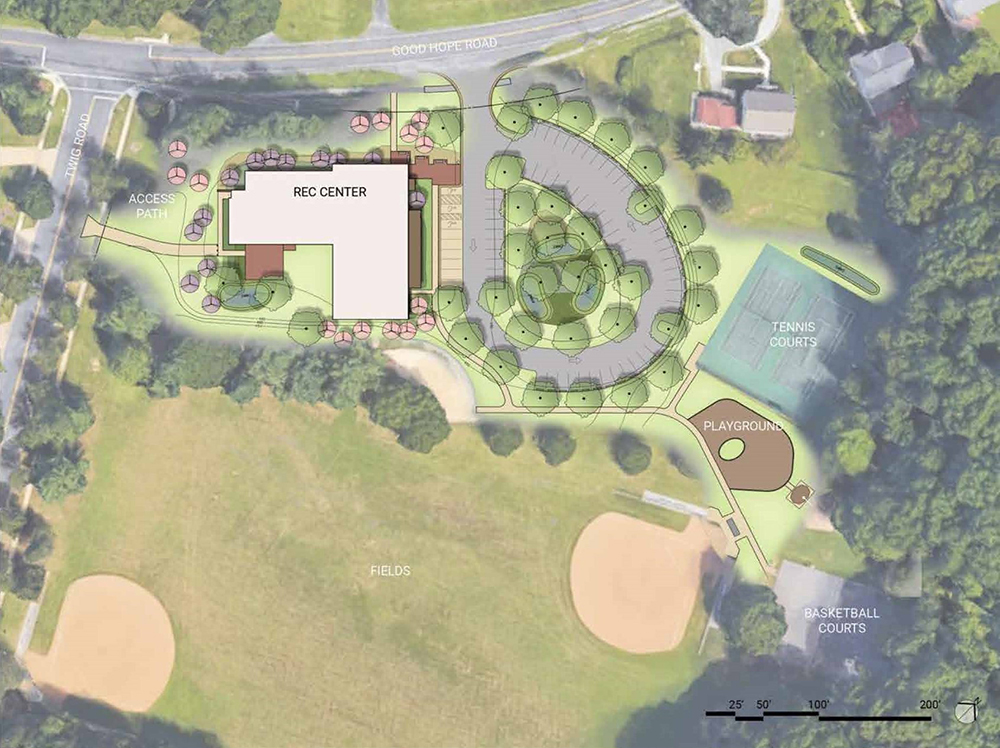 An illustration of a bird’s eye view of a building, trees, parking spaces and ball fields.