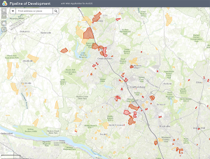 Map highlighting development areas in and around Gaithersburg, Maryland. Different shades of red outline the zones marked for development. Roads, parks, and forested areas are visible, with labels for neighboring towns and landmarks.