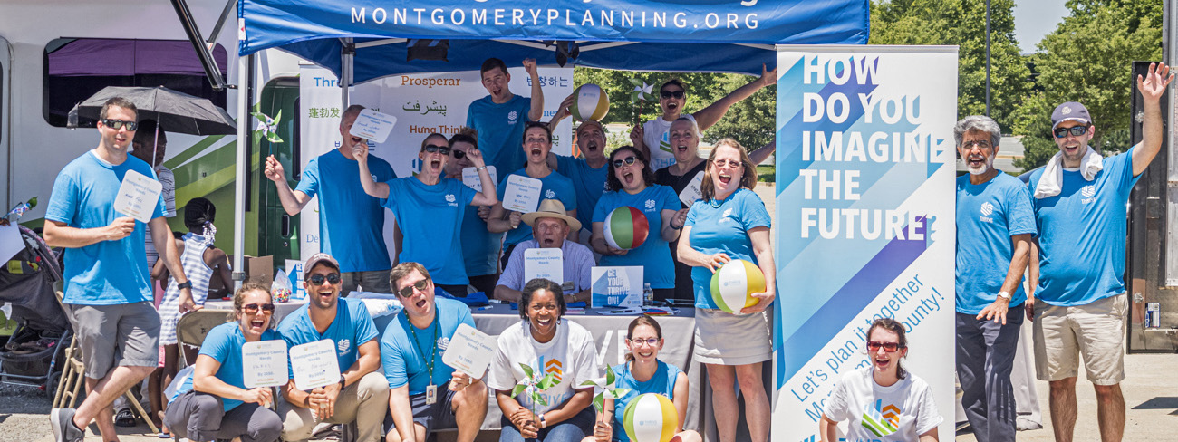 Group photo of Montgomery Planning staff at June 26 Thrive Week event at Shady Grove Farmers Market