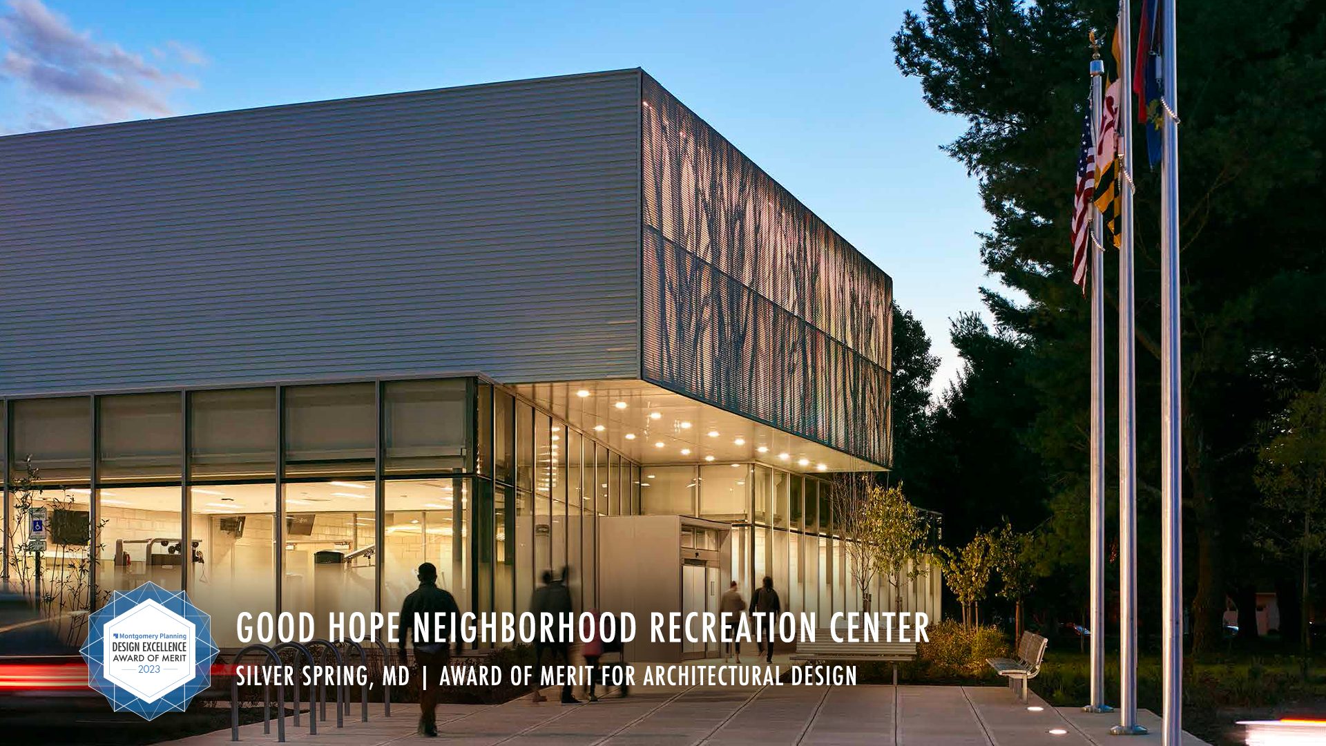 Good Hope Recreation Center. two story modern building with glass exterior on first story and flag poles outside