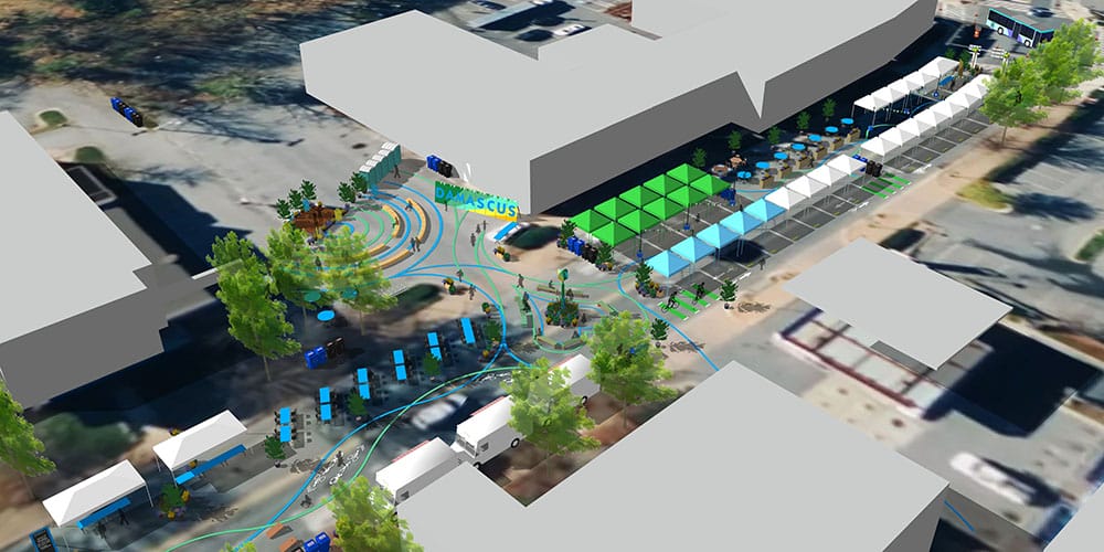 A 3D rendering of an aerial view with structured parking, multiple vehicles, and vibrant blue connectivity paths connecting various sections of the soon-to-be Damascus Placemaking Festival.