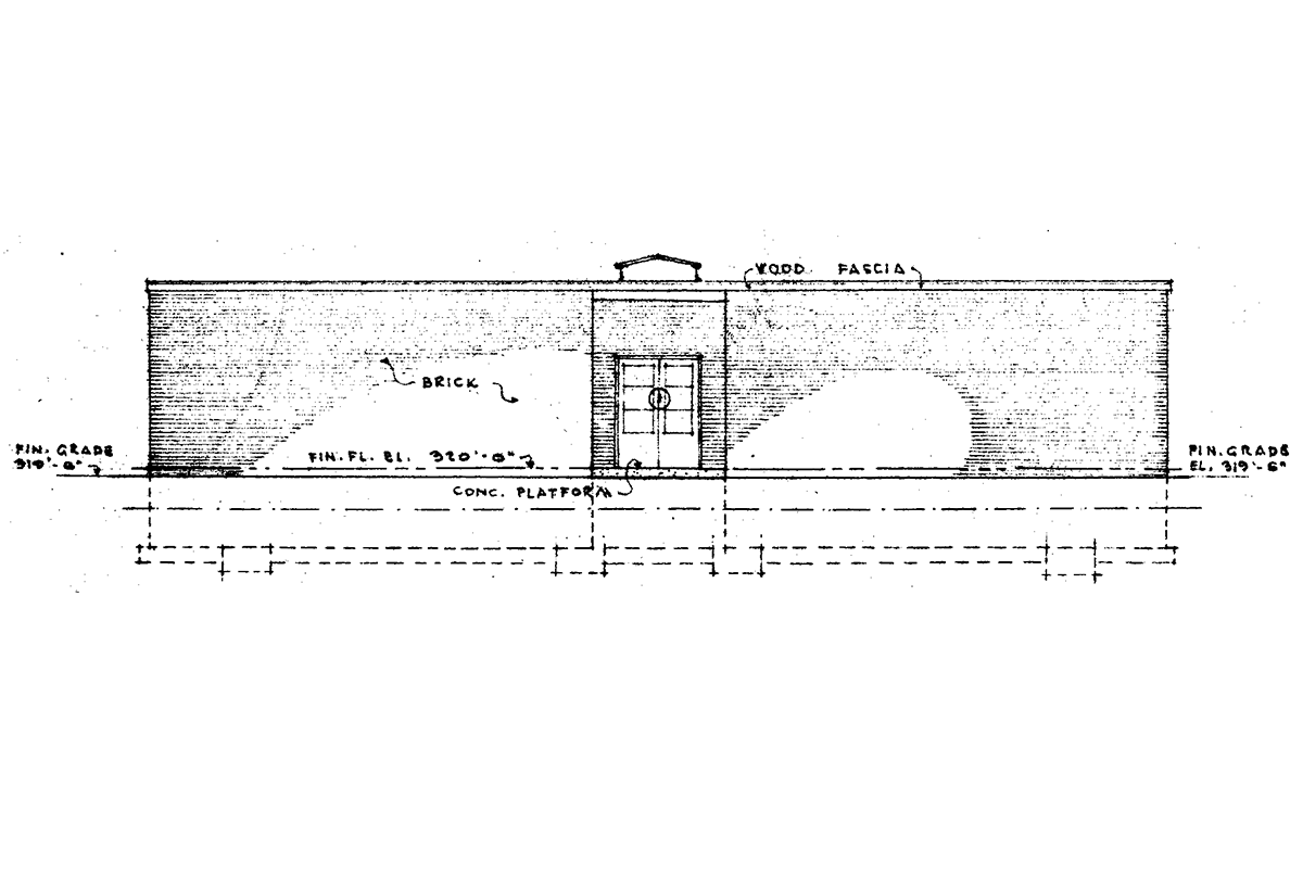 Architectural elevation drawing of a rectangular brick building with a central entrance, wood fascia at the roof, and labeled measurements.