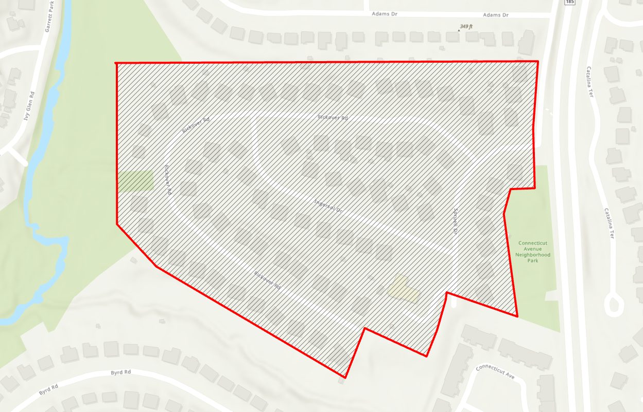 A map shows a shaded area outlined in red, indicating a specific neighborhood boundary with labeled streets and surrounding roads.